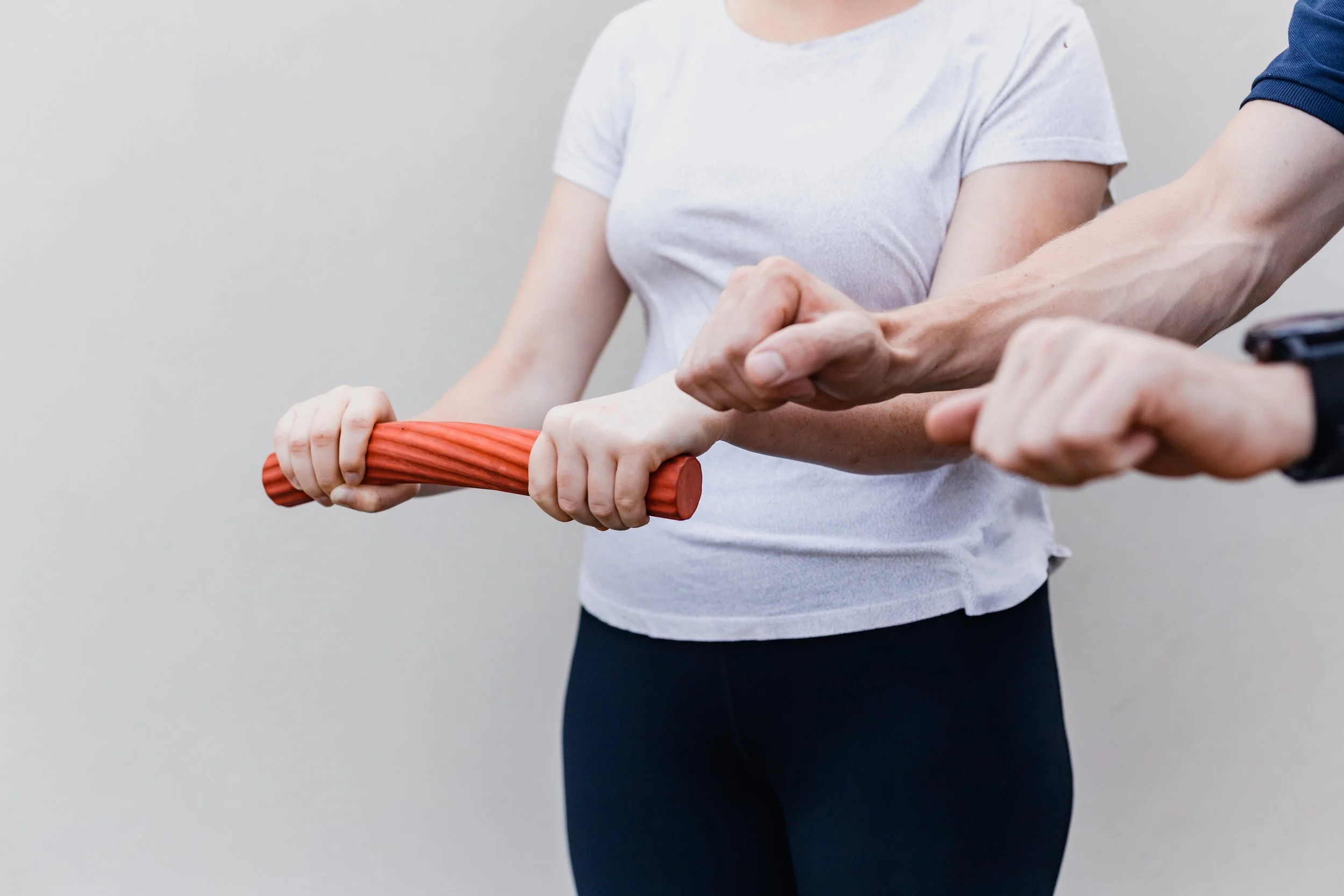 A patient using a massage roller
